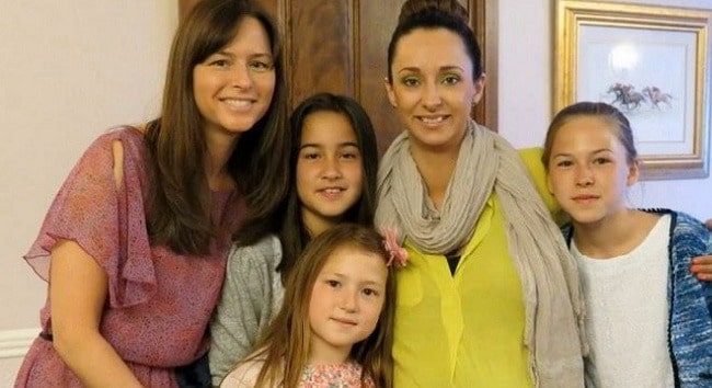 Sophie Belle Clapton posing by wearing pink outfit.